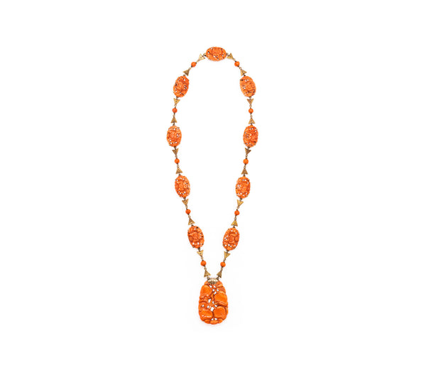*Art Deco 1920 chinoiserie necklace in 14 kt yellow gold with carvings of natural reddish coral