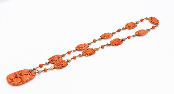 *Art Deco 1920 chinoiserie necklace in 14 kt yellow gold with carvings of natural reddish coral