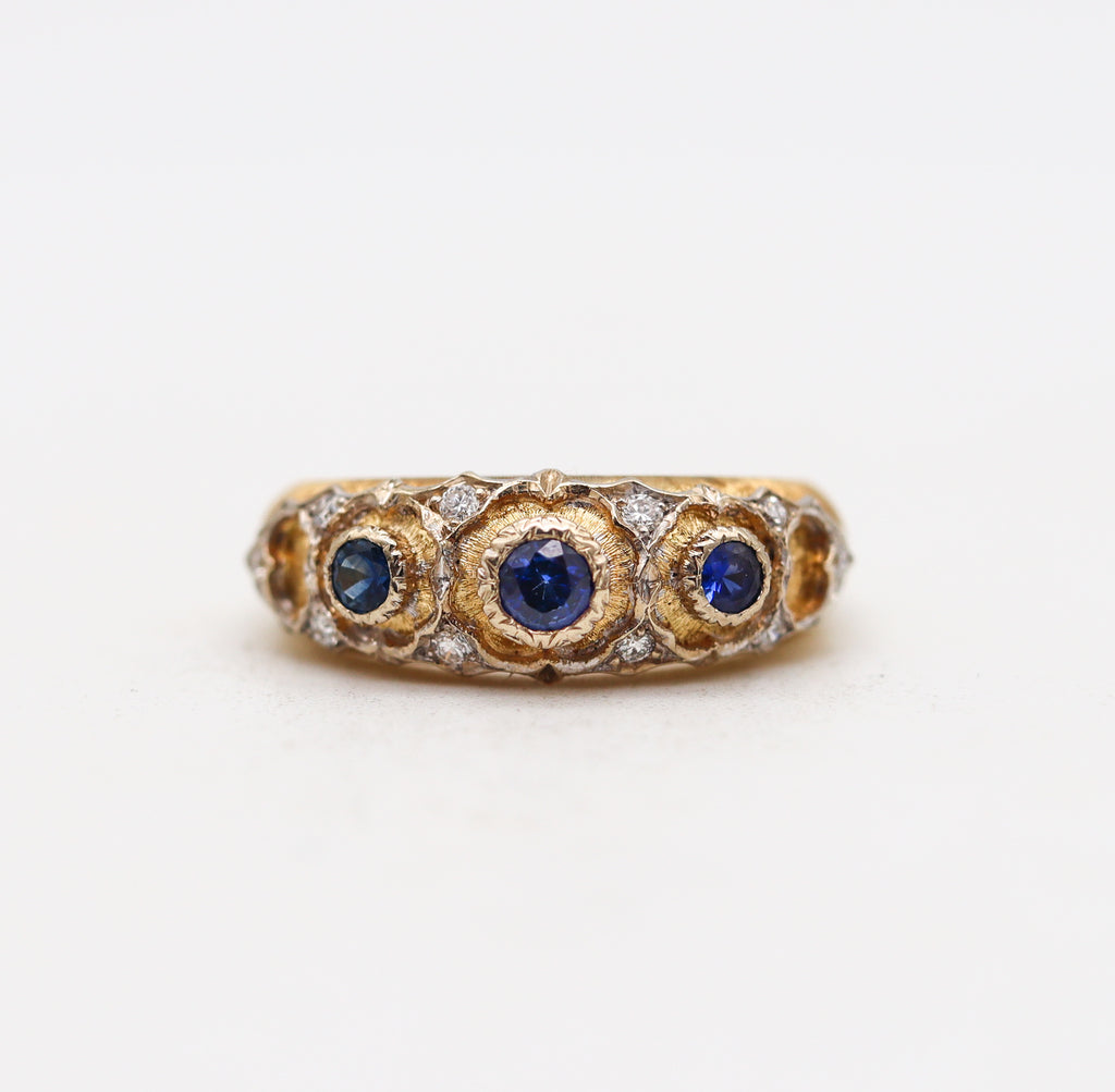 A Buccellati ring in 18K gold and white gold set with a faceted sapphire  and round brilliant-cut diamonds. - Bukowskis
