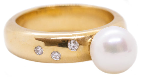 WHITE PEARL SOLITAIRE & DIAMONDS 18 KT RING