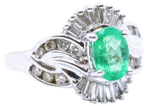 OVAL EMERALD & DIAMONDS 14 KT RING