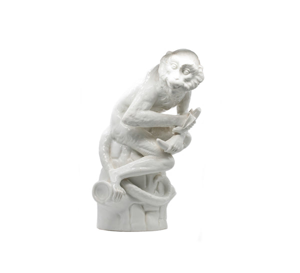 +KPM Germany 1950 Seated Monkey Eating A Banana Figure In White Glazed Porcelain