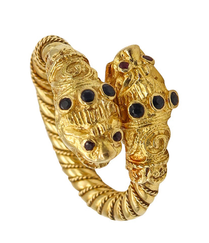 *Lalaounis 1970 Chimeras Lions Heads crossover Ring in 18 kt gold with Sapphires & Rubies
