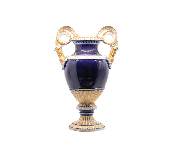 GERMANY 1900, MEISSEN BLUE AND GILDED PORCELAIN URN WITH SNAKE HANDLES