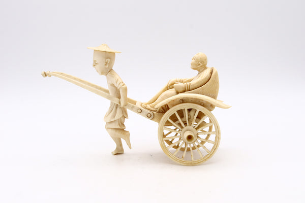 CHINA 1920 CHINESE CARVED MINIATURE OF A DOUBLE WHEELS CARRIAGE WITH RIDERS