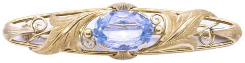 ART NOUVEAU 18 KT BROOCH WITH A BLUE SPINEL