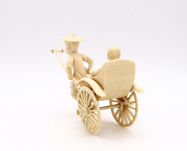 CHINA 1920 CHINESE CARVED MINIATURE OF A DOUBLE WHEELS CARRIAGE WITH RIDERS