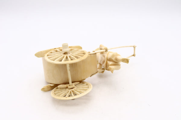 CHINA 1920 CHINESE CARVED MINIATURE OF A DOUBLE WHEELS CARRIAGE WITH RIDERS