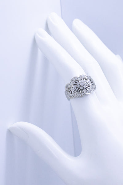 FLOWER MOTIF WITH DIAMONDS 18 KT GOLD RING