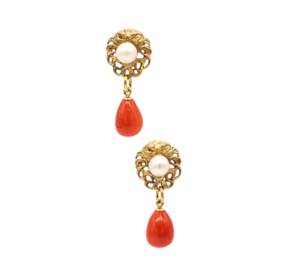 *Antique drop earrings in 18 kt yellow gold with dangling red coral and pearls