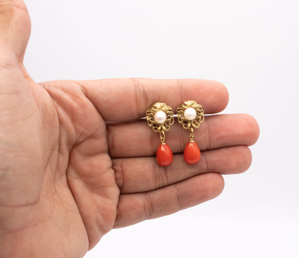 *Antique drop earrings in 18 kt yellow gold with dangling red coral and pearls